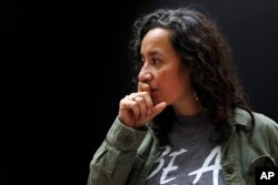 Ana Maria Archila, of New York City, co-executive director of the Center for Popular Democracy, pauses while being interviewed in Washington, Sept. 28, 2018, on Capitol Hill in Washington. Archila confronted Sen. Jeff Flake, R-Ariz., in an elevator after he said he would support Kavanaugh's nomination.