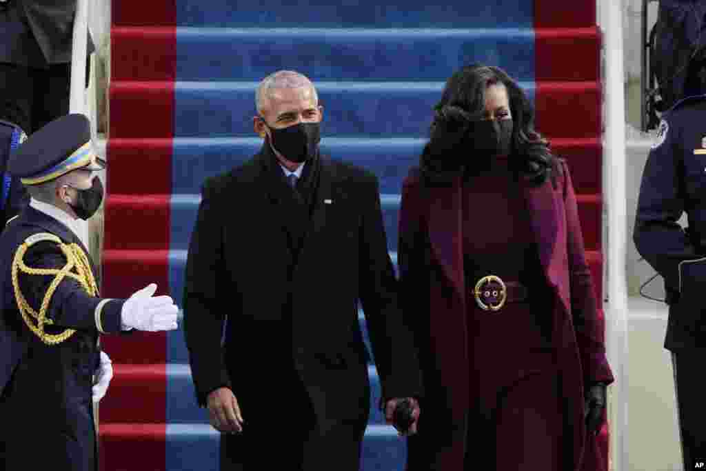 Former President Barack Obama and his wife Michelle arrive for the 59th Presidential Inauguration at the U.S. Capitol for President-elect Joe Biden in Washington, Wednesday, Jan. 20, 2021. (AP Photo/Patrick Semansky, Pool)
