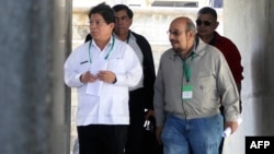 Nicaragua's Foregin Minister Denis Moncada (L), along with deputies Edwin Castro (R), Wilfredo Navarro (R back) and Jose Figueroa, leave as members of the opposition Civic Alliance failed to attend talks between the opposition and the government, in Managua, March 11, 2019.