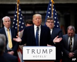 FILE - Republican presidential candidate Donald Trump speaks during a campaign event in the atrium of the Old Post Office Pavilion, in Washington, soon to be a Trump International Hotel, March 21, 2016.