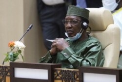 FILE - Chad President Idriss Deby takes part in a working session during the G5 Sahel summit in Nouakchott, June 30, 2020, .
