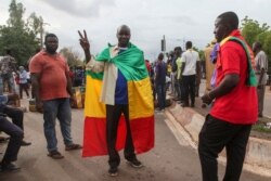Thousands marched on July 10, 2020, in Bamako in anti-government demonstrations urged by an opposition group that rejects the president's promises of reforms.