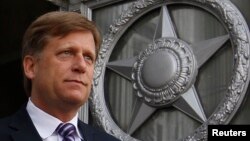 FILE - Then-U.S. Ambassador Michael McFaul is pictured leaving the Russian Foreign Ministry headquarters in Moscow, May 15, 2013.