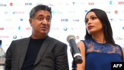 Indian film director Tabrez Noorani, left, answers a question with Bollywood and Hollywood actress Freida Pinto during a press conference on the opening day of the Indian Film Festival of Melbourne on August 10, 2018. Noorani's film 'Love Sonia' which stars Freida Pinto, Richa Chadha, Mrunal Thakur and Demi Moore, opened the festival.