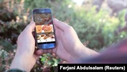 FILE - The Yummy app, a homemade food ordering service in Libya.