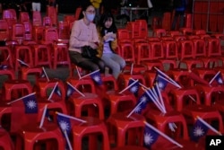 Many of the chairs at the Kuomintang party gathering sat empty after their presidential candidate Hou Yu-ih conceded defeat in New Taipei City, Taiwan, Jan. 13, 2024.