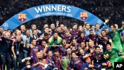 Les joueurs du Barça célébrant leur victoire en finale de Ligue des Champions contre la Juve, Stade Olympique de Berlin, 6 juin 2015.