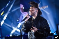 Recording artist The Weeknd performs at the 2015 Billboard Hot 100 Music Festival at Nikon at Jones Beach Theater, Aug. 22, 2015, in Wantagh, New York.