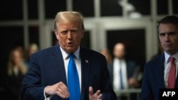 Former U.S. president and Republican presidential candidate Donald Trump speaks to the press during his trial for allegedly covering up hush money payments linked to extramarital affairs at Manhattan Criminal Court in New York on April 22, 2024.