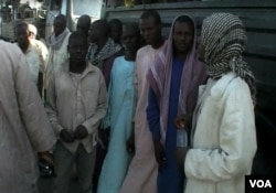 Nigerian refugees are seen at a gathering point before being repatriated to Nigeria, in Fotokol, Cameroon, April 19, 2017. (M.E. Kindzeka/VOA)