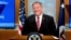 FILE - U.S. Secretary of State Mike Pompeo smiles during a news conference at the State Department, in Washington, U.S., April 29, 2020.