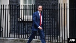FILE - Britain's Foreign Secretary Dominic Raab arrives in Downing Street in central London on October 8, 2019 for a meeting of the Cabinet.