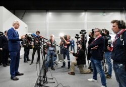 Dutch anti-immigration, anti-Islam politician Geert Wilders speaks to the media following the verdict in his appeal in Schiphol near Amsterdam, Netherlands, Sept. 4, 2020.