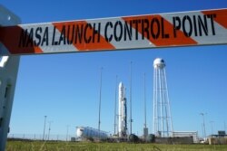 FILE - Northrup Grumman's Antares rocket is poised for launch at the NASA Wallops test flight facility in Wallops Island, Va., Oct. 1, 2020.