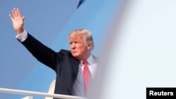 President Donald Trump boards Air Force One as he departs from Joint Base Andrews in Maryland, U.S. Aug. 30, 2018.