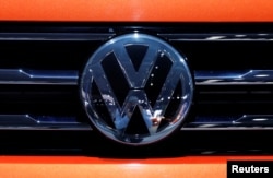 FILE PHOTO: The Volkswagen logo is seen on a vehicle in New York, March 29, 2018.