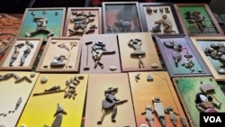 ადგილობრივი არტისტის მიერ შექმნილი ექსპონატები USAID-ს მიერ ორგანიზებული გამოფენაზე გორში