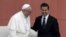 Pope Francis (L) and Mexico's President Enrique Pena Nieto participate in a ceremony at the National Palace in Mexico City, Feb. 13, 2016. 