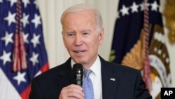 FILE - President Joe Biden speaks in the East Room of the White House to mayors attending the U.S. Conference of Mayors winter meeting in Washington, on Jan. 20, 2023.