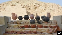 This photo provided by the Saqqara Saite Tombs Project in January 2023 shows vessels from an embalming workshop in Saqqara, Egypt.