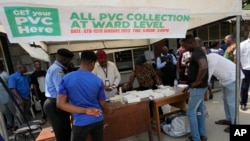 People line up to collect their permanent voters cards on Jan. 11, 2023, in Lagos, Nigeria, ahead of February's 2023 presidential elections. Authorities have been struggling to stem a wave of kidnappings and violence prior to the elections. 