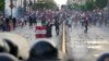 Anti-government protesters clash with police in Lima, Peru, Jan. 24, 2023. 