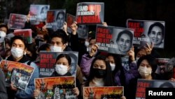Myanmar protesters residing in Japan rally to mark the second anniversary of 2021 military coup, outside the Embassy of Myanmar in Tokyo, Feb. 1, 2023.