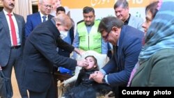 Pakistan Prime Minister Shehbaz Sharif administering polio vaccines to children to kickstart first anti polio campaign of the year on Jan 15, 2023. (Courtesy PM Office)