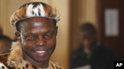 FILE - In this June 4, 2014 photo, lawyer Thulani Maseko, appears in court in the traditional animal skin garb of a Zulu warrior, in Mbabane, Eswatini.