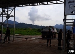 Aparat kepolisian sedang melakukan pemeriksaan terkait tewasnya dua pekerja di pabrik peleburan nikel di Morowali Utara, Sulawesi. (Foto: AFP)