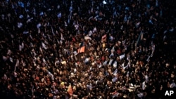 Israelis protest plans by Prime Minister Benjamin Netanyahu's new government to overhaul the judicial system, in Tel Aviv, Israel, Feb. 4, 2023. 