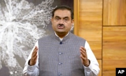 FILE - This grab from video released by Adani Enterprises Ltd. on Feb.2, 2023, shows Indian billionaire Gautam Adani addressing investors from an unknown location.