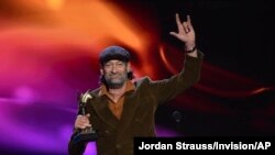 Troy Kotsur accepts the award for best supporting male for "CODA" at the 37th Film Independent Spirit Awards on Sunday, March 6, 2022, in Santa Monica, Calif. 