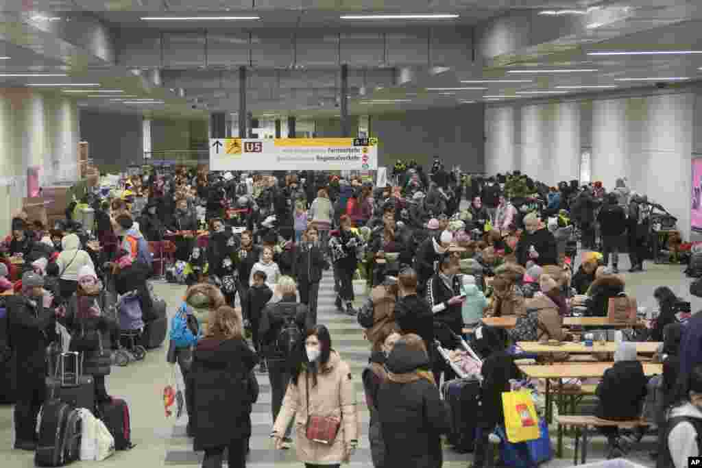 Refugees rest in a subway hall after fleeing from the Ukraine at the main train station in Berlin, Germany, March 14, 2022.&nbsp;Germany&#39;s Interior Ministry said that it has so far registered 146,998 refugees from Ukraine coming to the country, but the real number may differ if people didn&#39;t register or moved on to another country.