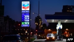 Gas prices of more than $7.00 per gallon are posted at a downtown Los Angeles gas station, March 9, 2022.