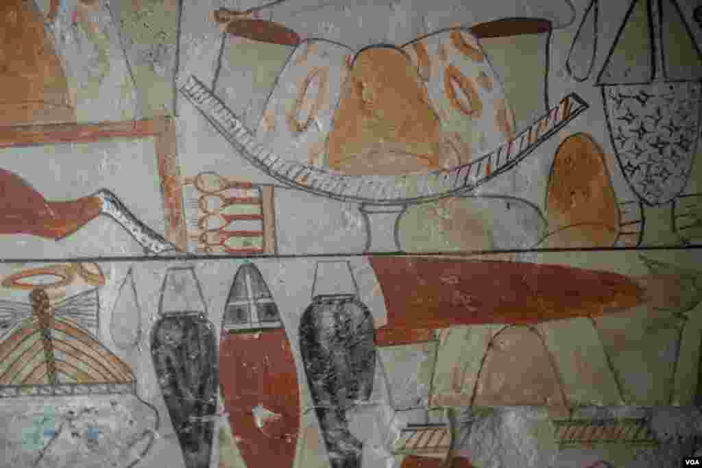 Murals in the tombs show tables filled with meat and fruit as well ancient oils, in Giza, Egypt, March 19, 2022. (Hamada Elrasam/VOA) 