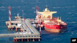 FILE - A tanker is anchored at an oil export terminal in the far eastern port of Kozmino, Russia, Dec. 28, 2009.