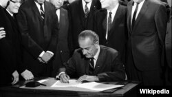 U.S. President Lyndon B. Johnson signs the Indian Civil Rights Act, Washington, D.C., April 11, 1968.