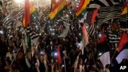 Supporters of opposition groups take part in anti-government rally in Islamabad, Pakistan, March 28, 2022.