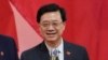 Sekretaris Utama Hong Kong John Lee menghadiri resepsi, setelah upacara pengibaran bendera untuk perayaan 24 tahun serah terima Hong Kong ke China, di Hong Kong, Kamis, 1 Juli 2021. (Foto: AP/Kin Cheung)