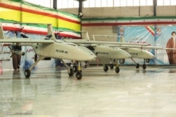 Iranian Mohajer-6 drones can be seen on display in Iran in this photo published in 2018. (Mehr News)