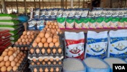 ຕະຫຼາດຂາຍໄຂ່ໄກ່ ແລະເຂົ້າສານ ຢູ່ບ້ານໂຊກໃຫຍ່ ນະຄອນວຽງຈັນ