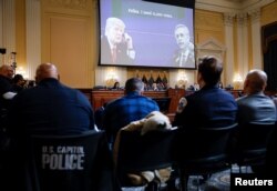 From left, Capitol Hill police officer Harry Dunn, former Metropolitan Police Department officer Michael Fanone, MPD officer Daniel Hodges and U.S. Capitol Police Sergeant Aquilino Gonell attend the final meeting of the U.S. House Select Committee investigating the January 6 attack on the U.S. Capitol, Washington, D.C., Dec. 19, 2022.