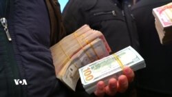 کاریگەری ناجێگیری بەهای دۆلار لەسەر بازاڕەکانی هەرێم