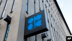 FILE - The logo of the Organization of the Petroleoum Exporting Countries (OPEC) is seen outside of OPEC's headquarters in Vienna, Austria, on March 3, 2022.