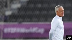 France's head coach Didier Deschamps walks on the pitch during training in Doha, Qatar, Dec. 16, 2022. "I have no worries or stress," he said about France's World Cup Final match against Argentina. "The important thing in preparing for a match like this is to remain calm." 