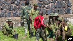 Members of the armed forces of the Democratic Republic of the Congo are pictured at a checkpoint north of Goma, Nov. 25, 2022. M23 rebels were still fighting and advancing on one front of their offensive in eastern DRC on Friday as a cease-fire came into force.