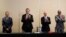 FILE - Venezuelan opposition delegate Gerardo Blyde Perez, Mexican Foreign Minter Marcelo Ebrad, Norwegian diplomat Dag Nylander and National Assembly President Jorge Rodriguez applaud after signing a pact to create a fund for the poor, at a meeting in Mexico City, Nov. 26, 2022.