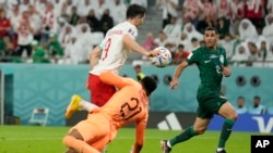 Poland's Robert Lewandowski (9) during the World Cup group C soccer match between Poland and Saudi Arabia at the Education City Stadium in Al Rayyan, Qatar, Saturday.