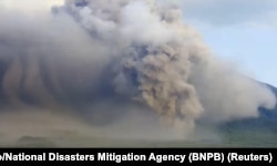 Mount Semeru volcano erupts as seen from Lumajang, East Java province, Indonesia, Dec. 4, 2022.